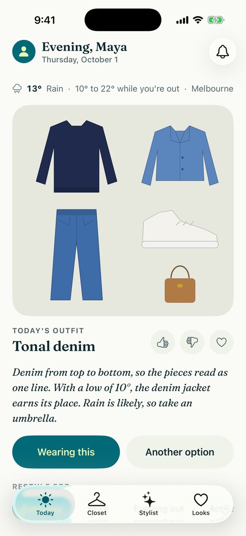 Styla's Today screen: 13 degrees and rain in Melbourne, an outfit of a navy jumper, denim jacket, jeans, white sneakers and a tan tote, titled Tonal denim, with a note on why it works.